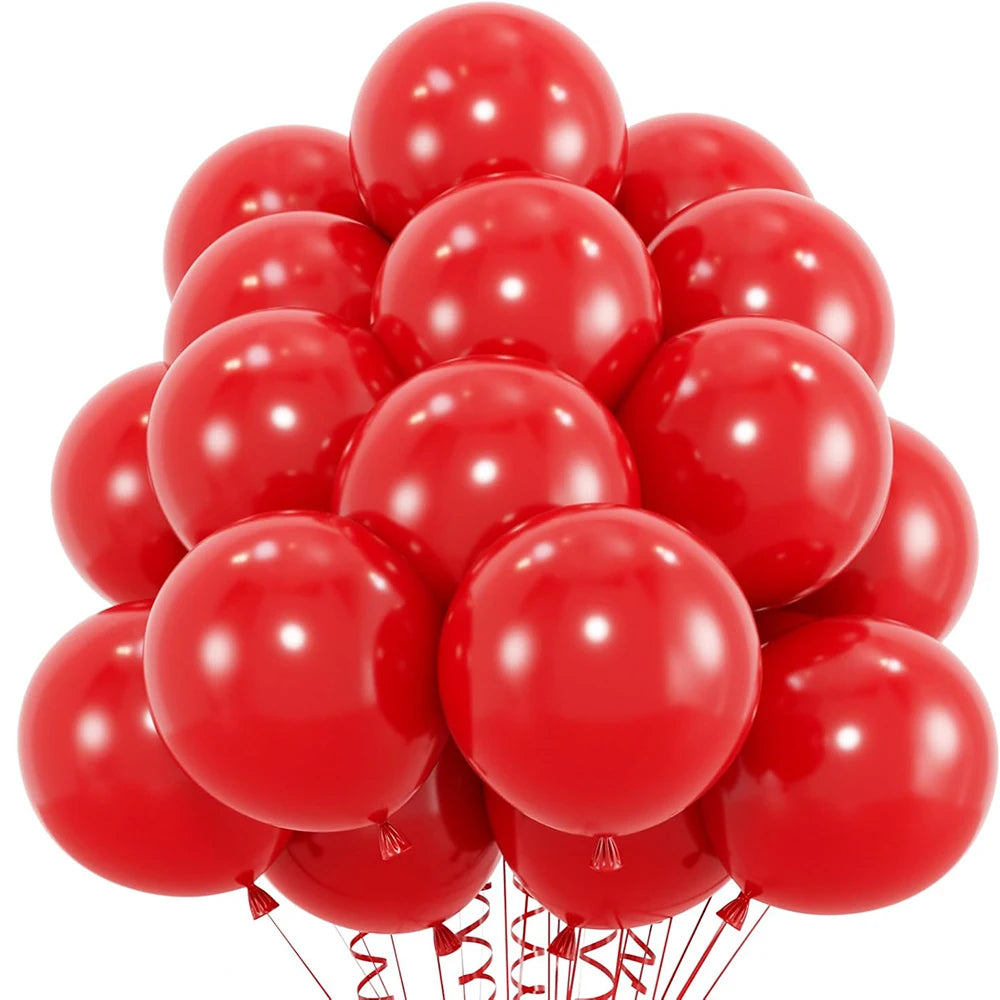 A cluster of bright red latex balloons tied together for a party or celebration.