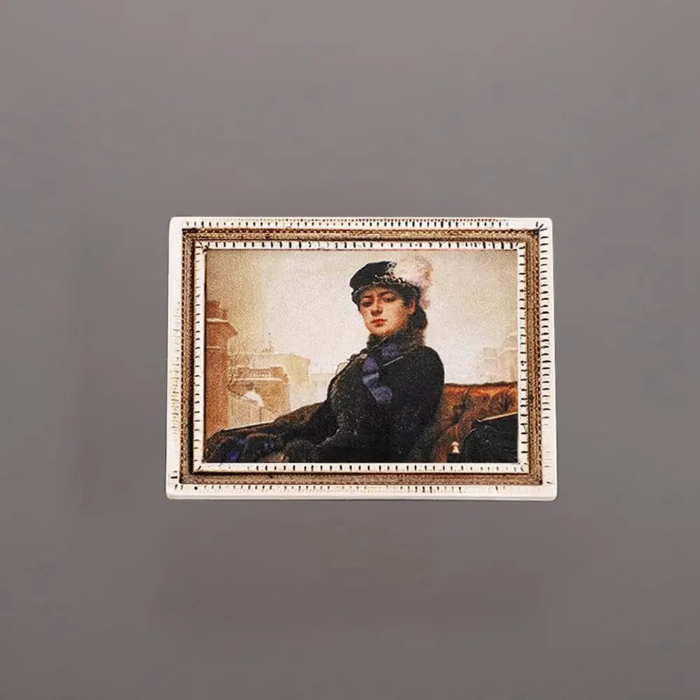 A framed vintage painting featuring a portrait of a woman in dark clothing and a white collar, displayed on a white card.
