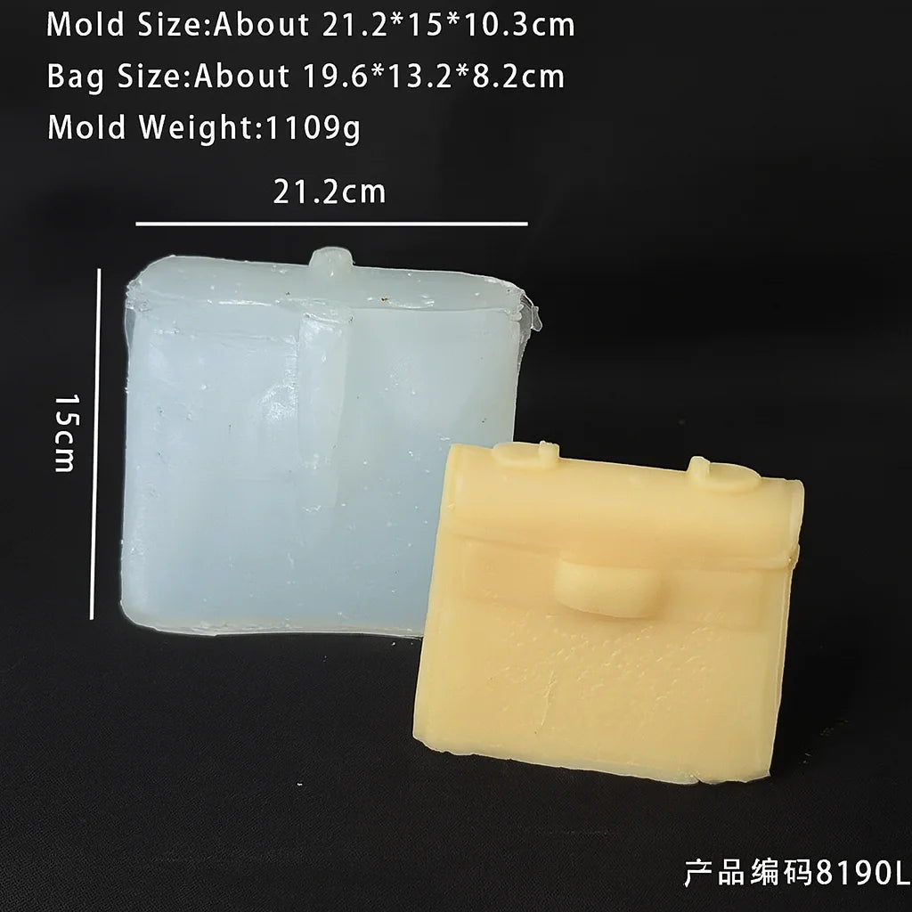 A clear silicone mold for a handbag-shaped candle or craft item, shown next to its corresponding yellow product.