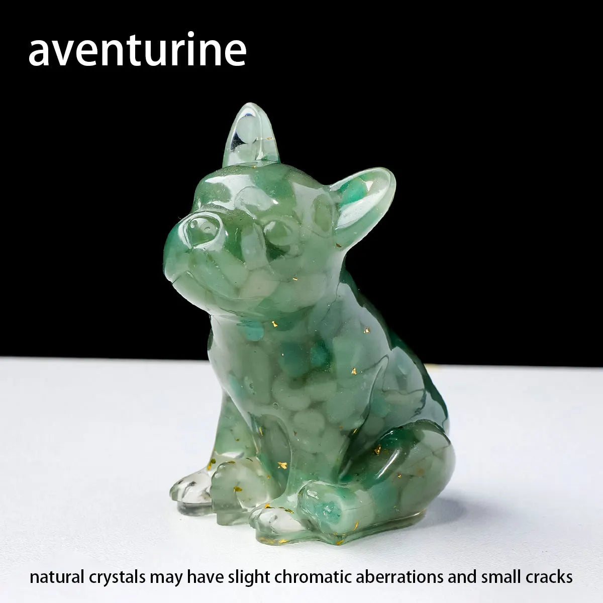 A translucent green crystal dog statue in a sitting pose used as a dropper for Feng Shui and decor