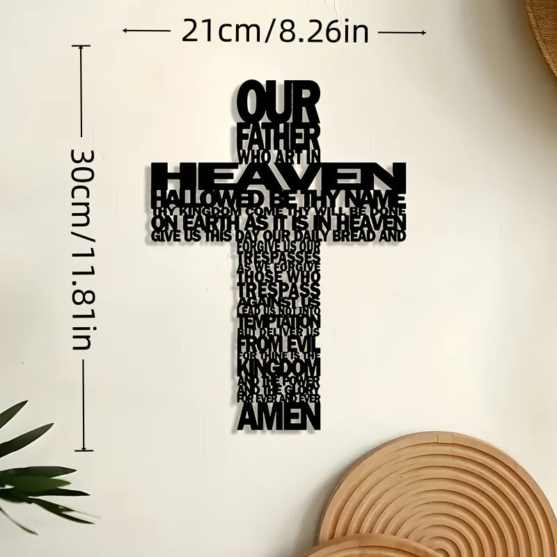Black metal cross wall art with the inscription Our Father Who Art In Heaven and Amen