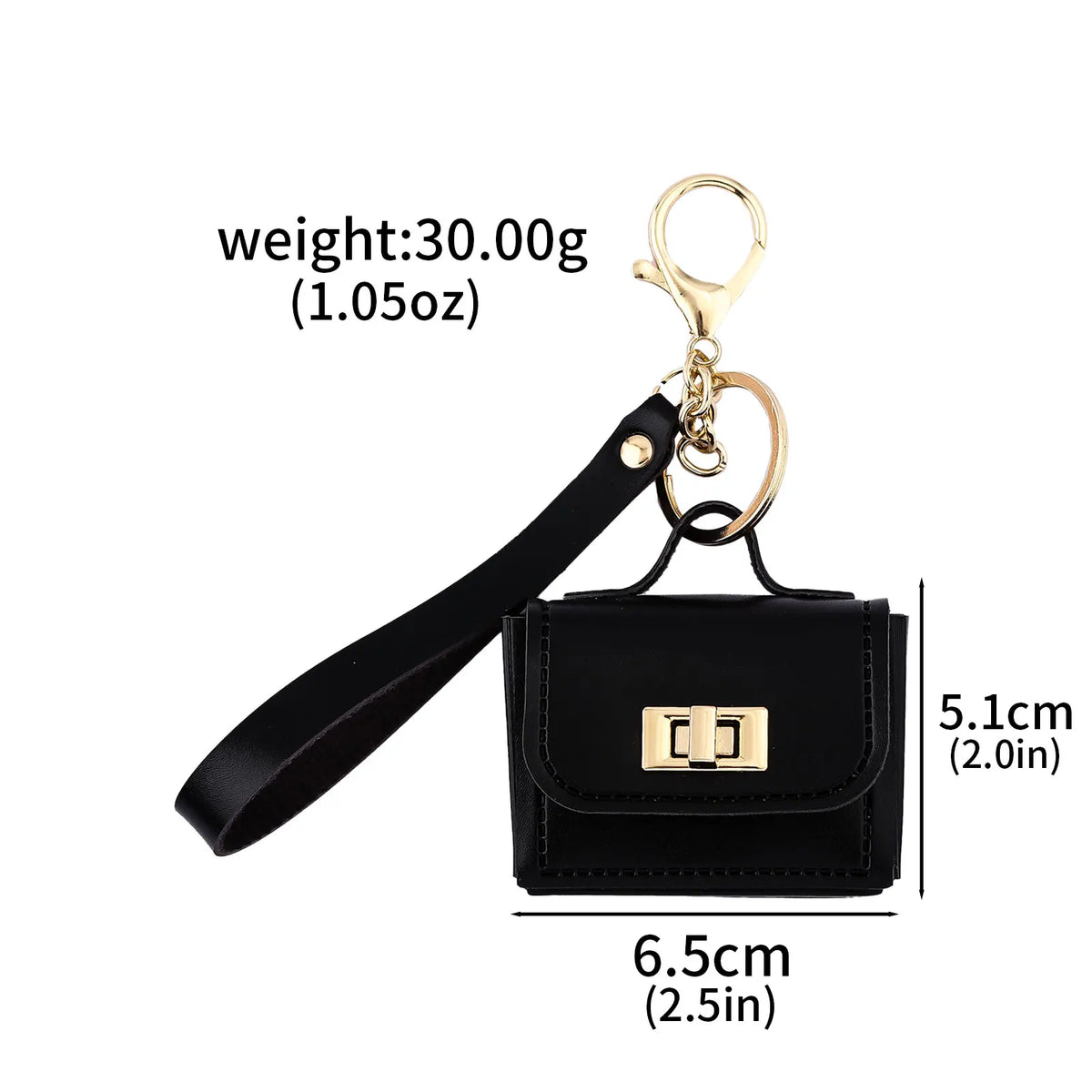A black mini leather openable bag with a gold chain keychain attached.
