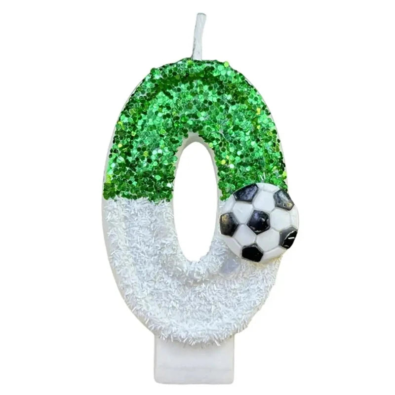 A custom birthday candle shaped like the number zero, decorated with green glitter and a white fuzzy texture.