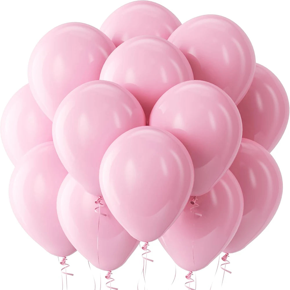 A cluster of pink latex balloons tied together, ready for a celebration.