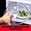 A hand is holding a transparent microwave splatter guard with a handle and steam vent over a plate of food.