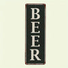 A vertical rectangular metal sign with the word BEER painted in white on a black background.