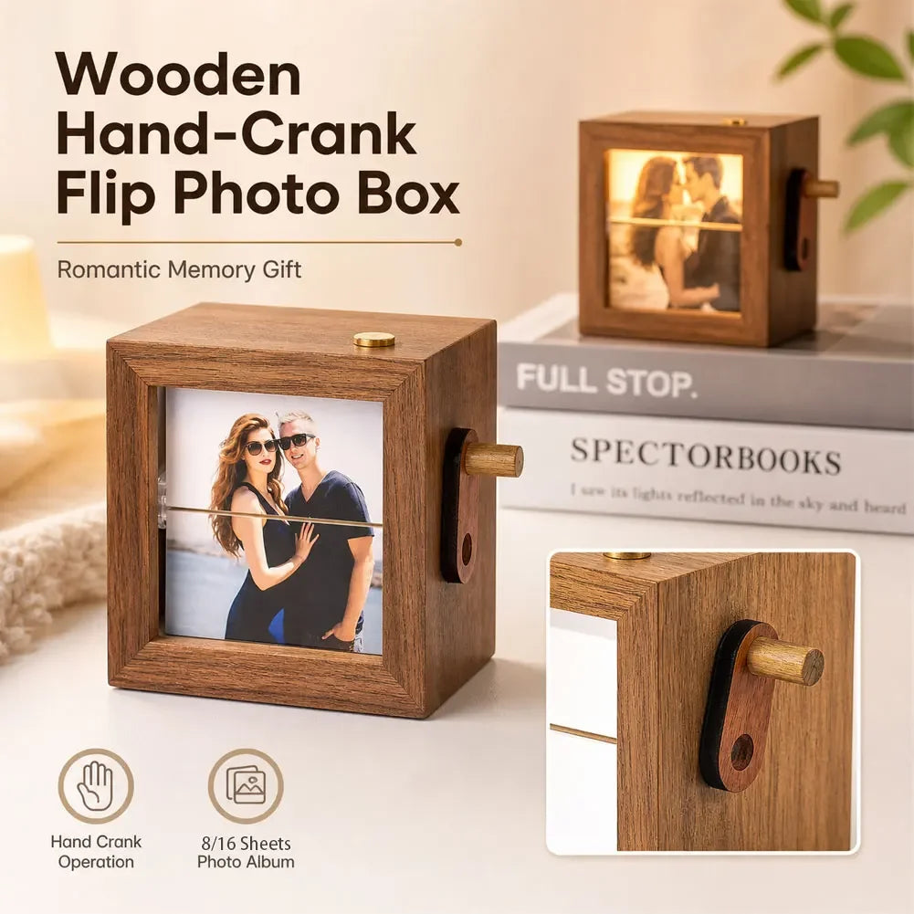 A wooden hand-crank flip photo box with an LED light is displayed on a white surface.