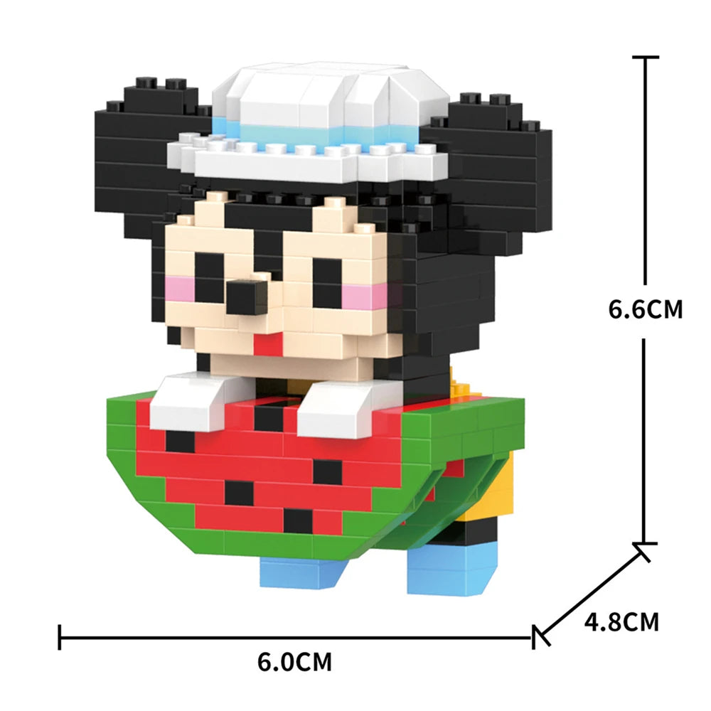A black and white animal model built from LEGO bricks, featuring a face and a green body.
