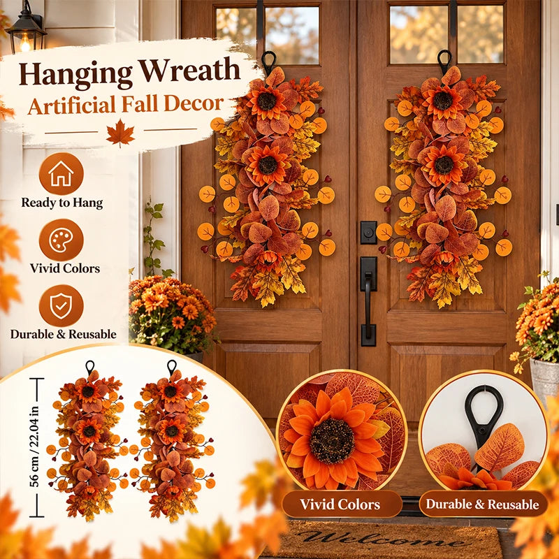 Artificial fall decor featuring orange and brown sunflower teardrop swag with maple leaves for front door hanging