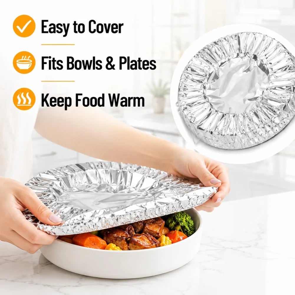 A hand holds a reusable aluminum foil bowl cover over a white bowl of food, demonstrating easy covering and heat retention.