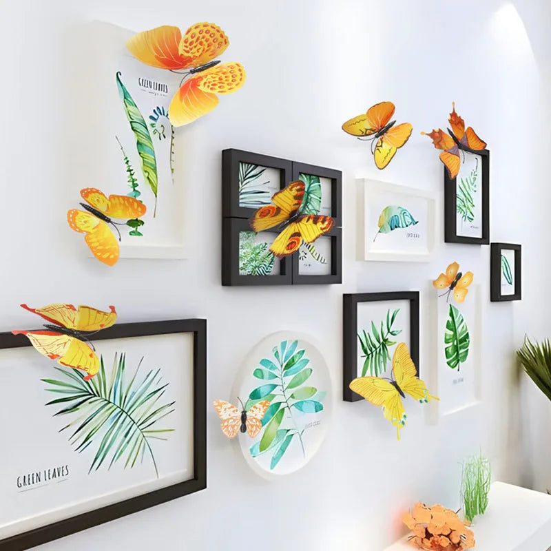 A gallery wall display featuring twelve colorful 3D butterfly wall stickers on a white wall.