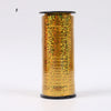 A roll of gold glitter curling ribbon used for gift wrapping and party decor.