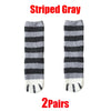 A pair of striped gray cozy cat paw print plush socks.