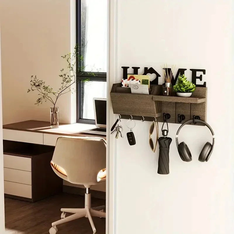 A rustic wooden wall key holder with a shelf and seven hooks mounted on a white wall.