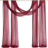 Maroon chiffon arch drapes used as a backdrop for weddings and events