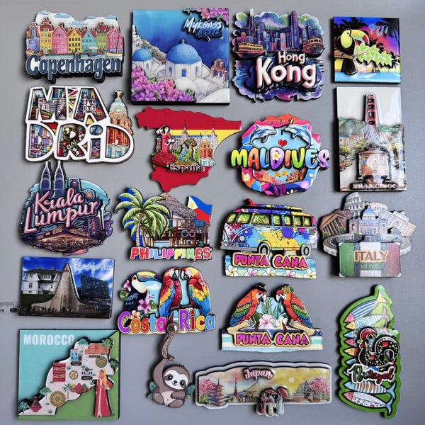A collection of wooden fridge magnets featuring various destinations like Copenhagen, Hong Kong, Maldives, and Morocco.