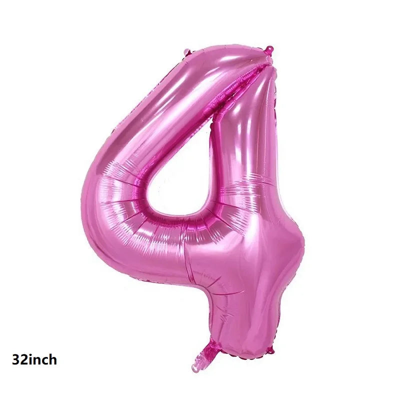 A large, pink foil balloon shaped like the number 4 for party decorations.