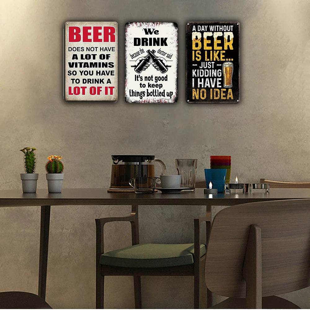 Three vintage metal tin signs featuring humorous sayings about beer and drinking for wall decor