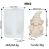 A white silicone mold for a candle shaped like a gnome with a honeycomb hat design.