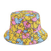 A yellow and pink duck print reversible bucket hat