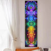 Vertical tapestry featuring vibrant, colorful chakra designs for spiritual decor