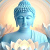 A serene blue Buddha statue with a glowing halo and lotus design.
