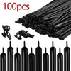 A collection of matte black latex balloons and various black balloon tools are shown.