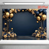 A dark blue and gold floral backdrop featuring balloons and greenery for a party decoration.