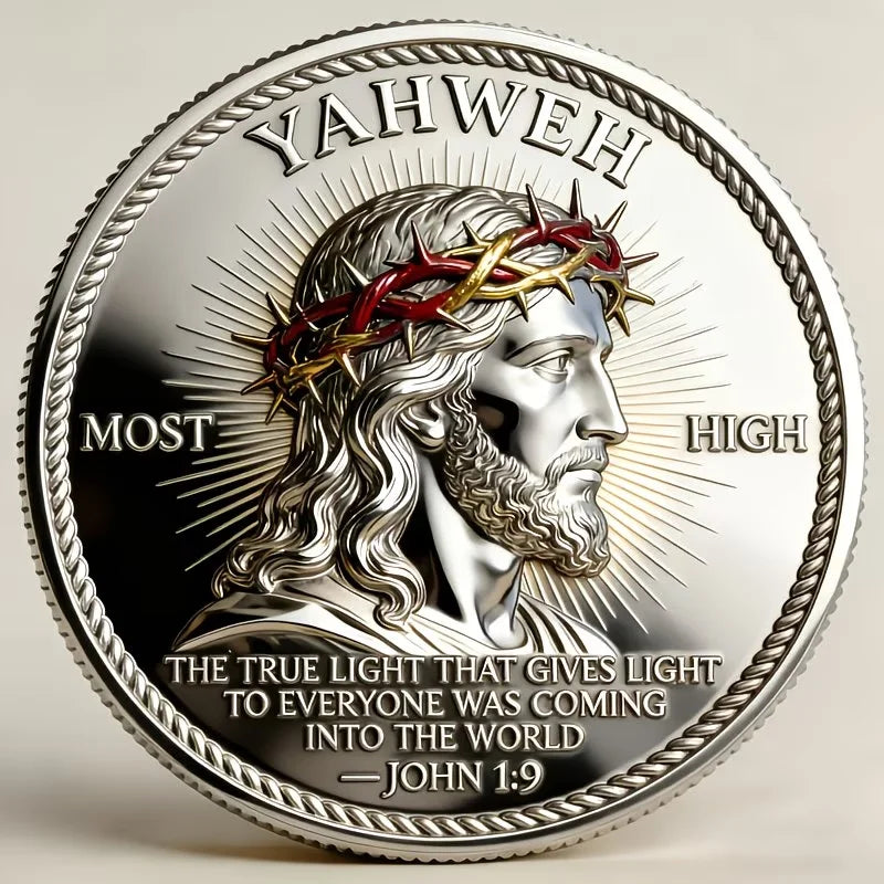 A silver challenge coin featuring a depiction of Jesus with a crown of thorns and rays of light.