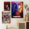 A set of three movie posters featuring characters from the Terrifier films displayed on a white wall.