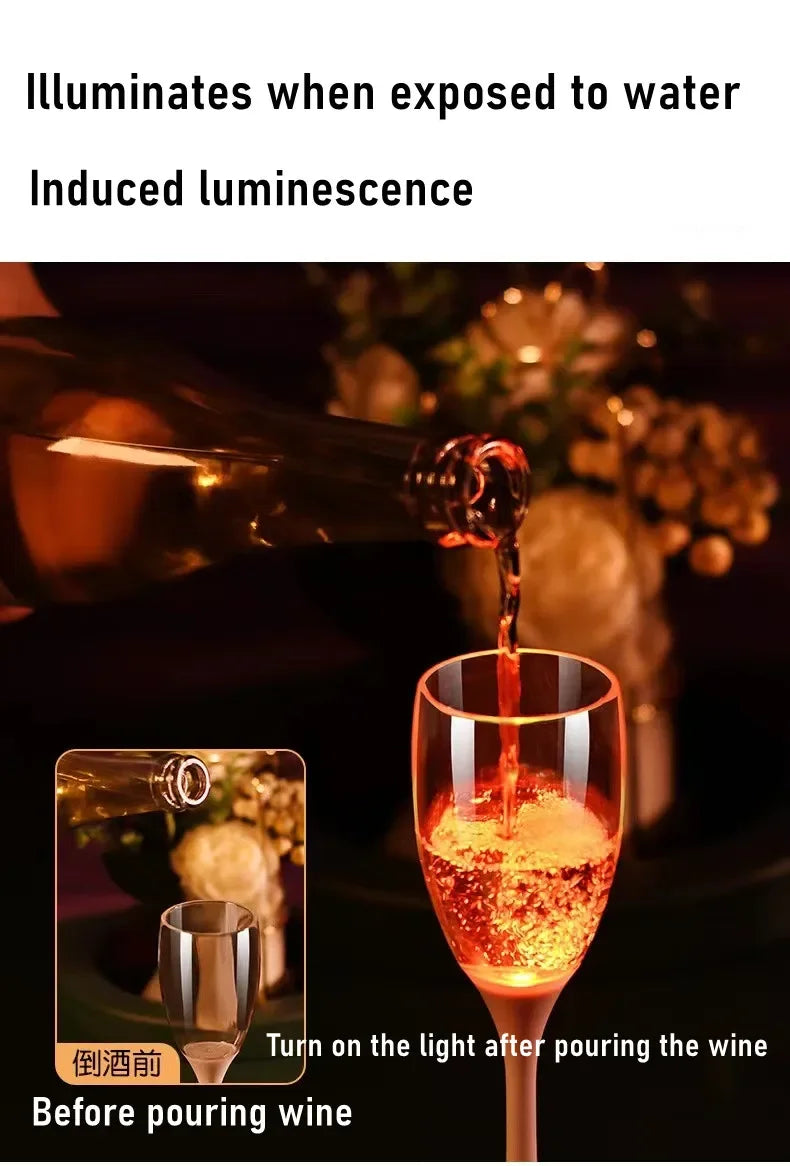 Un verre de vin rouge est versé dans un verre à pied, illuminant avec une vive lueur orange.