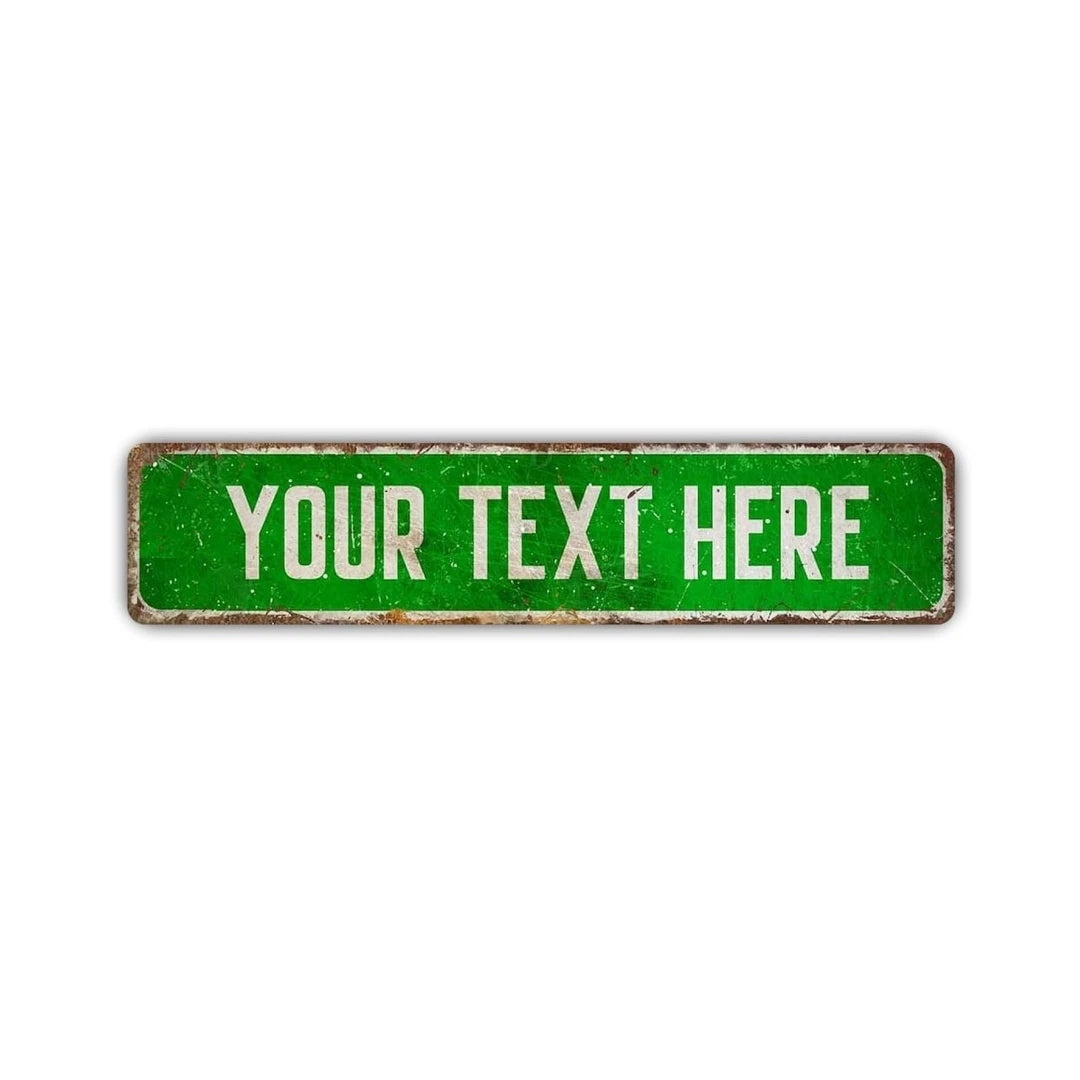 A rectangular, weathered green aluminum street sign with the text YOUR TEXT HERE.