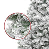 Close-up view of a flocked artificial Christmas tree with realistic snowy branches.
