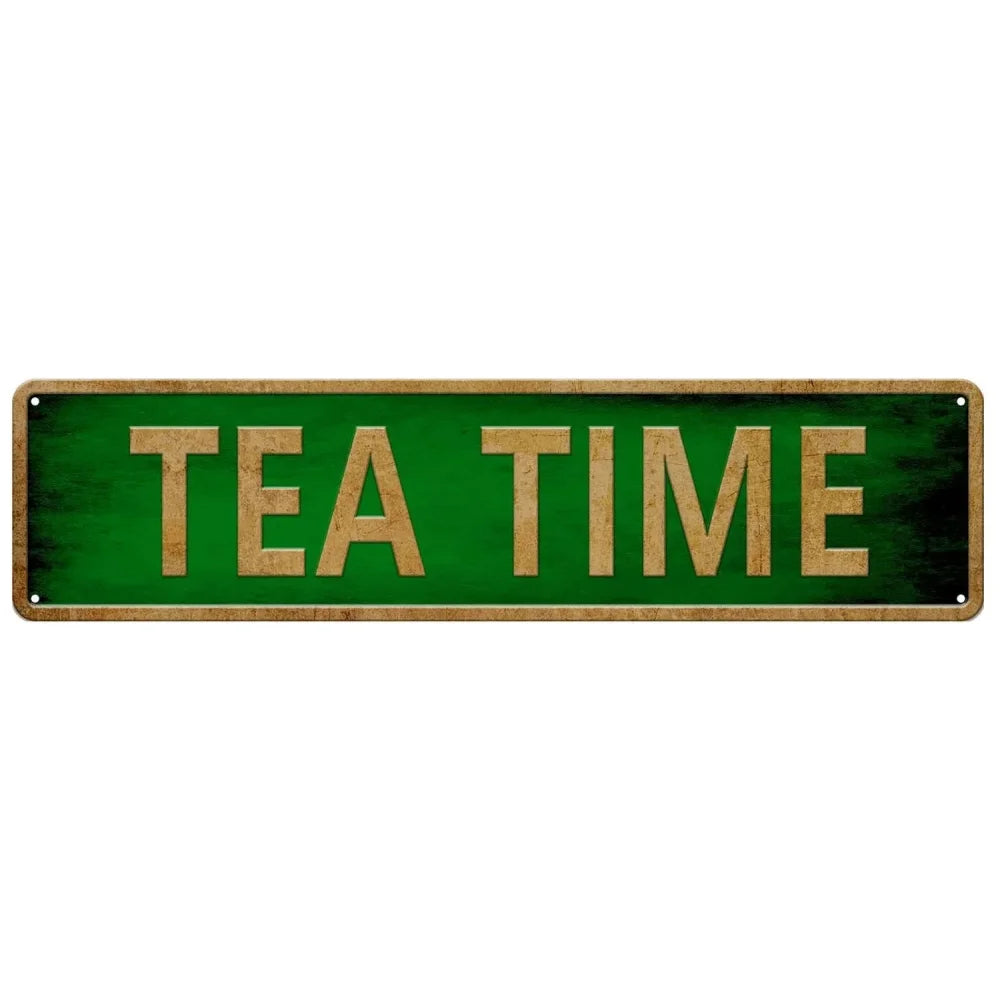 A rectangular wooden sign with green background and gold lettering that reads TEA TIME