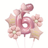 Pink foil balloons shaped like the number six and flowers for a birthday celebration