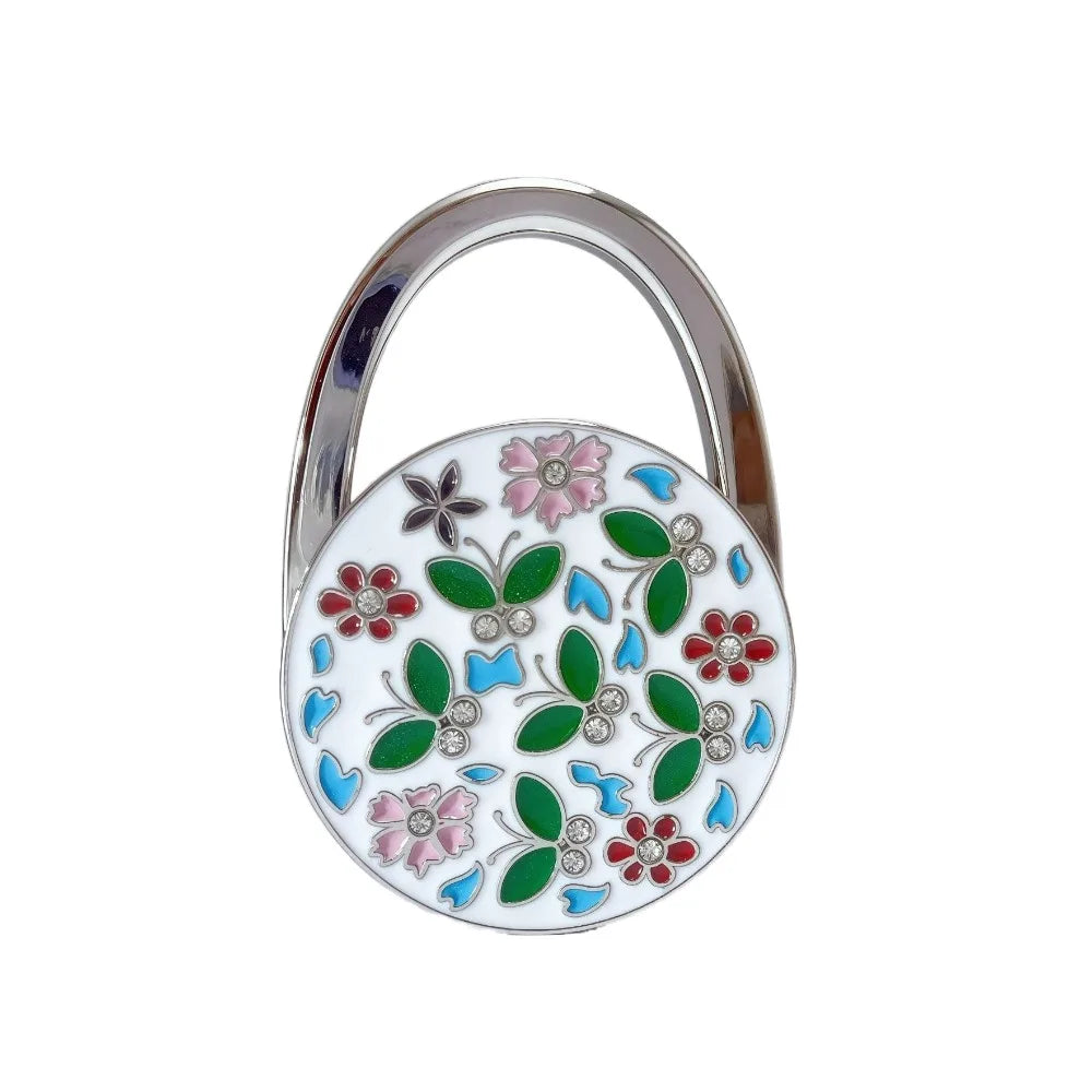 Silver floral crystal handbag hook designed for tables