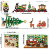 A set of Christmas advent calendar building blocks featuring Santa, a decorated tree, and a train model.