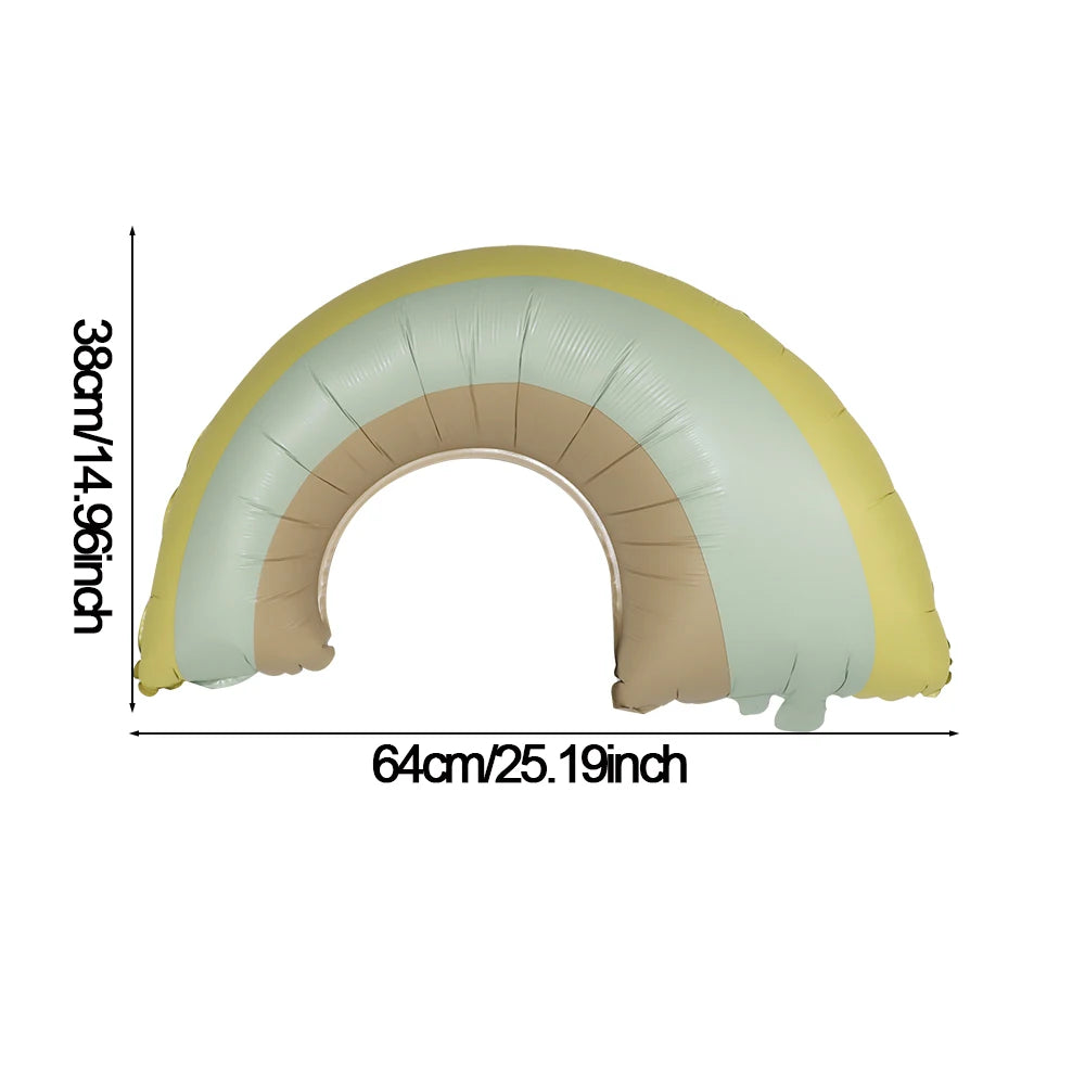 A curved foil balloon shaped like a heart, featuring matte colors of yellow, beige, and light green.