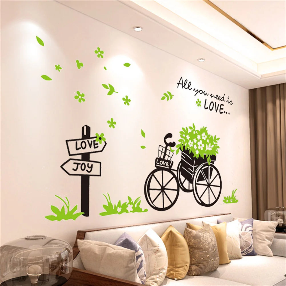 Wall stickers featuring text like LOVE JOY and All you need in LOVE on a white wall