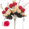 A bouquet of artificial silk roses in shades of red and cream on a stem.