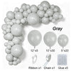 Gray latex balloon garland kit featuring various sizes of balloons, ribbon, chain, and glue.