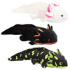 A white and pink axolotl plush toy is shown next to a black and green patterned axolotl plush toy.