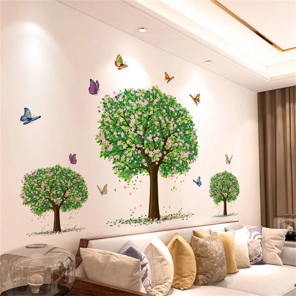 A wall display featuring adorable cute rose-themed stickers of trees and butterflies on a white wall.