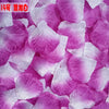 Pink and white silk rose petals used for weddings and events