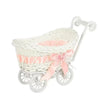 White faux rattan woven storage basket with a pink ribbon and handle