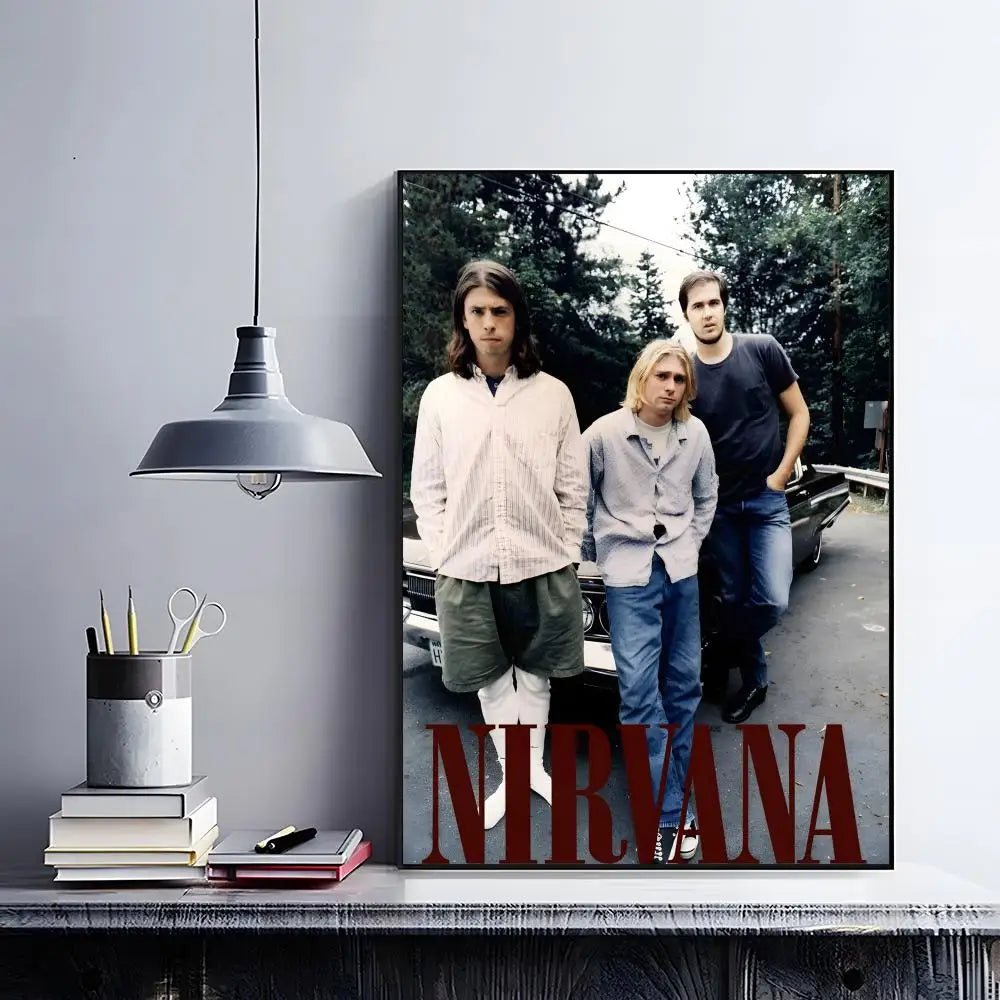 A framed poster featuring the band Nirvana with three male figures in a dark, moody style.