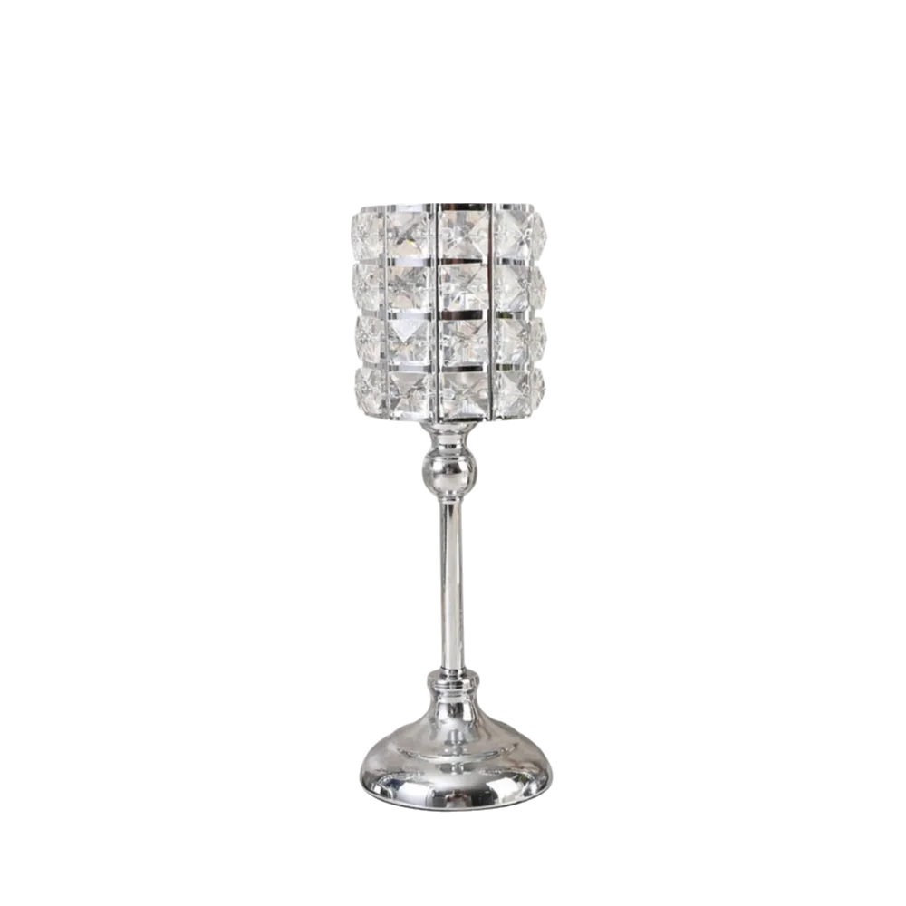 Porta-velas de cristal claro con cuenco facetado texturizado y base decorativa.