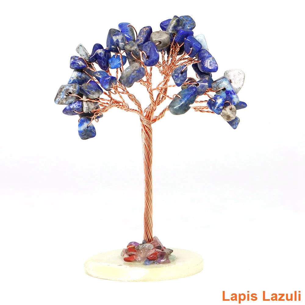 Natural crystal money tree decor featuring blue lapis lazuli crystals on a copper wire branch.
