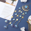 Gold flame moon crystal sun catcher jewelry featuring various celestial charms and crystals