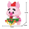 A pink pig model built from micro building blocks, showing its dimensions.